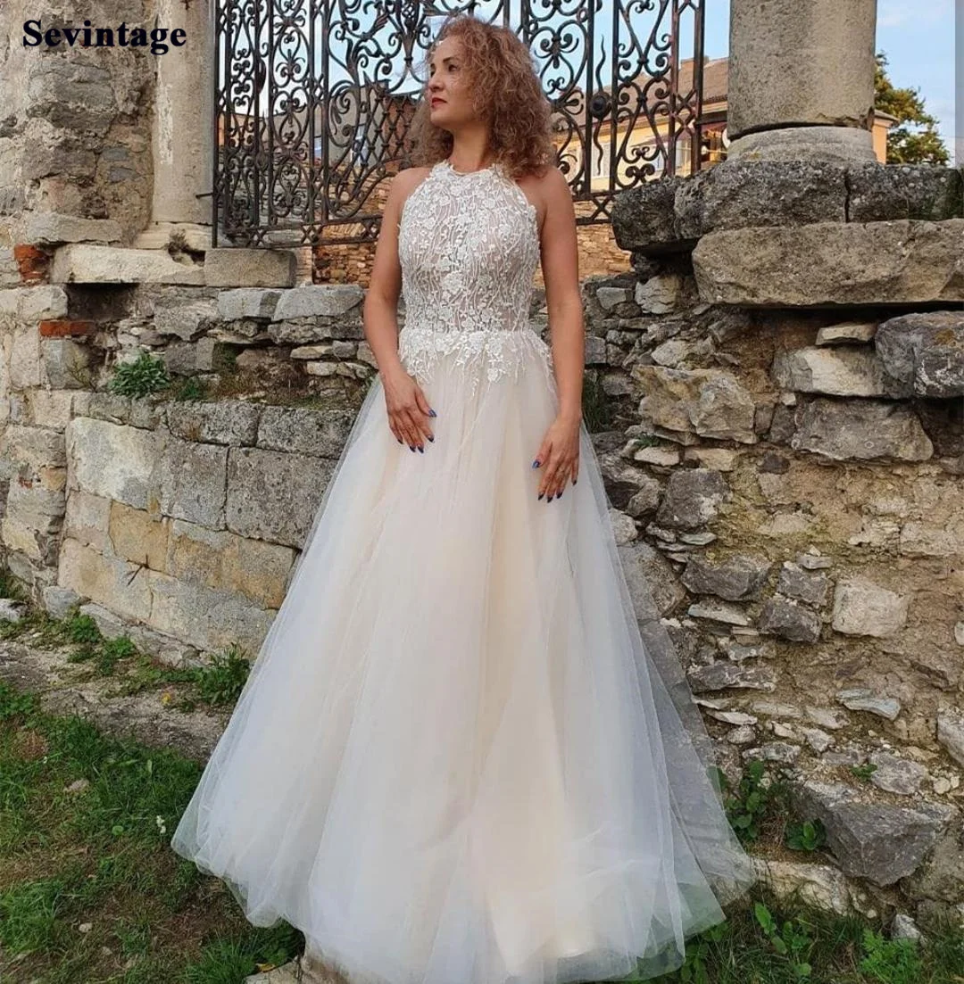 Beach Lace Bride Dress Halter Princess Countryside Boho Wedding Gowns Sleeveless Floor Length Plus Size Wedding Dresses 2021
Beach Lace Bride Dress Halter Princess Countryside Boho Wedding Gowns Sleeveless Floor Length Plus Size Wedding Dresses 2021