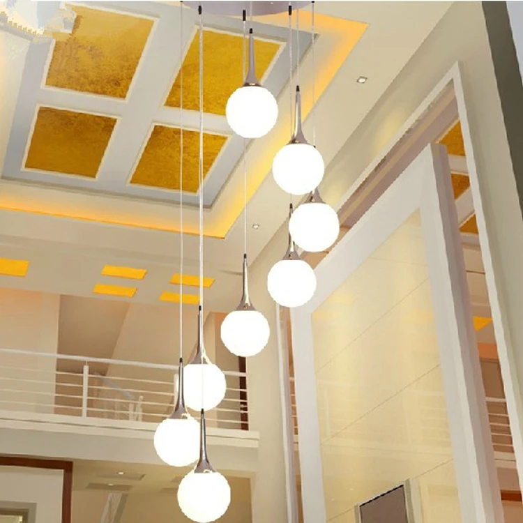 Modern minimalist stair chandelier rotating long chandelier Villa double creative glass ball personality restaurant LED lights
Modern minimalist stair chandelier rotating long chandelier Villa double creative glass ball personality restaurant LED lights