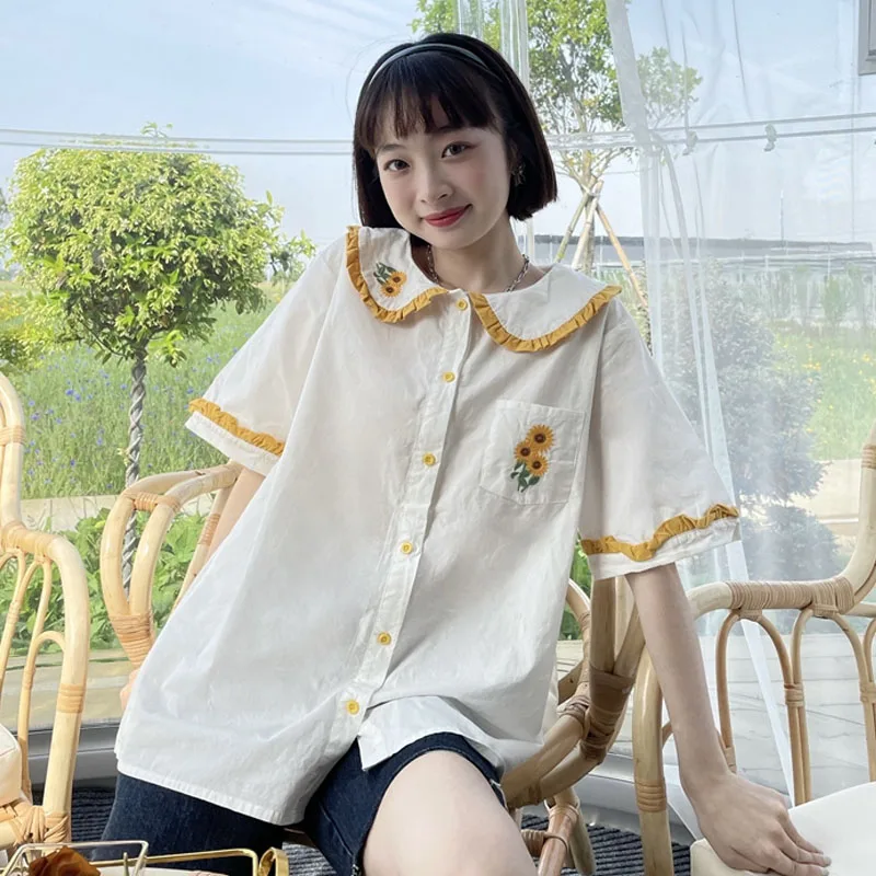 Japanese Summer Sweet White Women Blouse Shirt For Top Soft Girly Peter Pan Collar Cute Sunflower Embroidery Ruffles Shirts 2021 
Japanese Summer Sweet White Women Blouse Shirt For Top Soft Girly Peter Pan Collar Cute Sunflower Embroidery Ruffles Shirts 2021