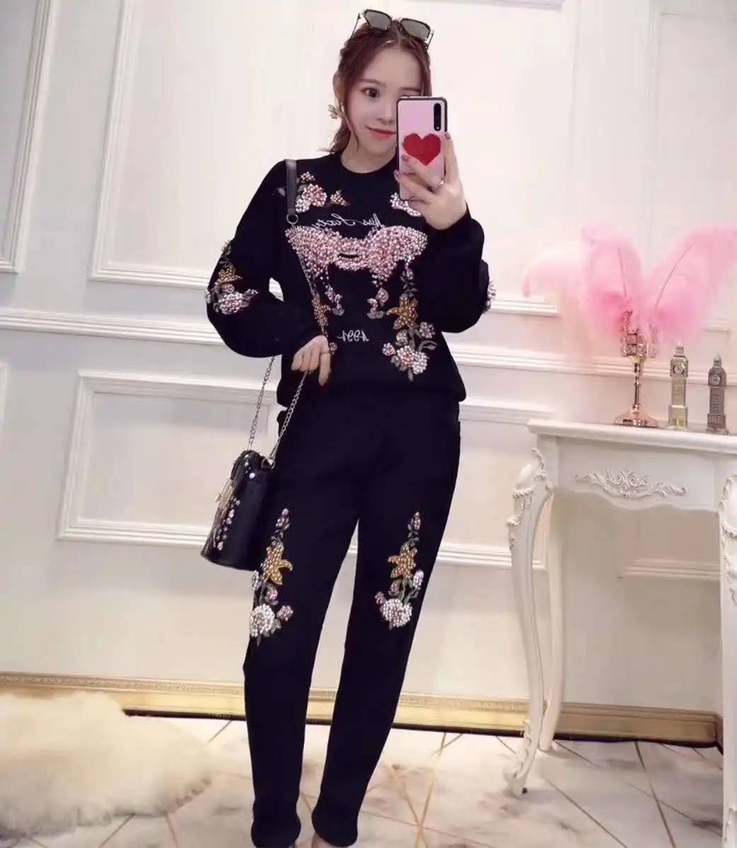 Autumn And Winter New Two-Piece Embroidered Flowers Pants + Beading Knitted Sweater Fashion Female Loose Two-Piece Sets
Autumn And Winter New Two-Piece Embroidered Flowers Pants + Beading Knitted Sweater Fashion Female Loose Two-Piece Sets
