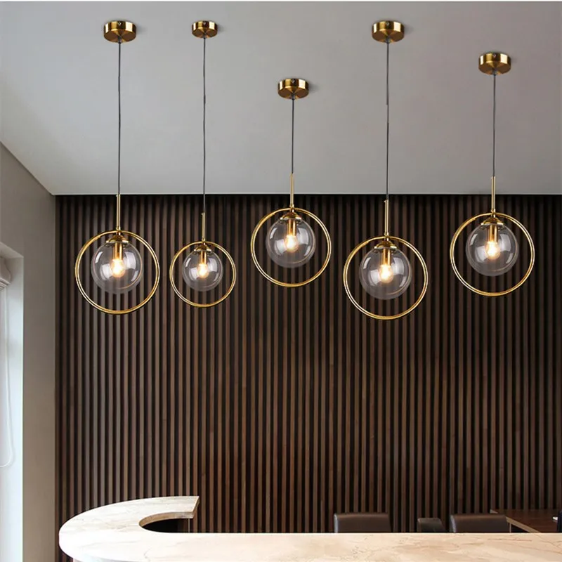 Nordic Led Lustre Iron Ring Magic Bean Lamp Living Room Decoration Lamps Creative Bedroom Kitchen Cafe Art Deco Pendant Lights
Nordic Led Lustre Iron Ring Magic Bean Lamp Living Room Decoration Lamps Creative Bedroom Kitchen Cafe Art Deco Pendant Lights