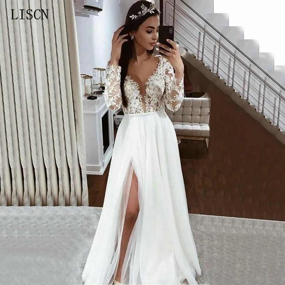 High Side Split Sexy V Neck Long Sleeve Boho Tulle Wedding Dress Lace Appliques Floor Length Bridal Gowns Country Beach Vestido
High Side Split Sexy V Neck Long Sleeve Boho Tulle Wedding Dress Lace Appliques Floor Length Bridal Gowns Country Beach Vestido