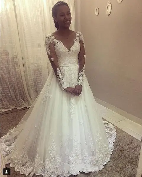 Lace Plus Size A-Line Wedding Dresses Long Sleeves African Wedding Gown Court Train White Lace Appliques Bridal Gowns
Lace Plus Size A-Line Wedding Dresses Long Sleeves African Wedding Gown Court Train White Lace Appliques Bridal Gowns