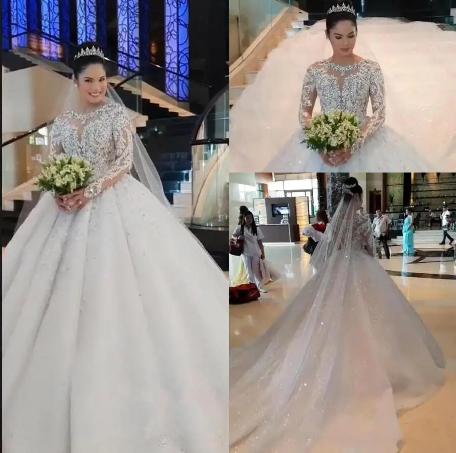 Vestidos de Noiva Lace Ball Gown Wedding Dresses Long Sleeves Beaded Rhinestones Appliques Lace Chapel Bridal Modest Weddimg
Vestidos de Noiva Lace Ball Gown Wedding Dresses Long Sleeves Beaded Rhinestones Appliques Lace Chapel Bridal Modest Weddimg