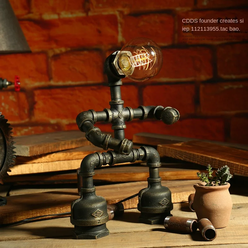 Decorative practical creative iron pipe loft Edison led eye protection lamp industrial retro coffee bar water pipe robot table l
Decorative practical creative iron pipe loft Edison led eye protection lamp industrial retro coffee bar water pipe robot table l