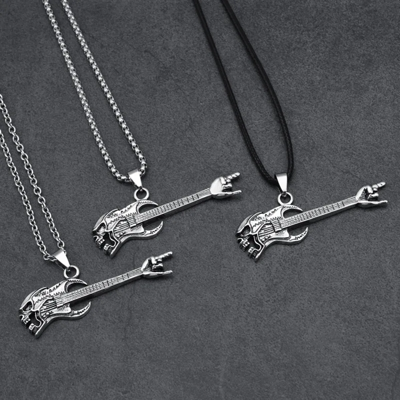 European and American Guitar Necklace Hip Hop Hipster Musical Instrument Pendant Personality Domineering Finger Necklace
European and American Guitar Necklace Hip Hop Hipster Musical Instrument Pendant Personality Domineering Finger Necklace