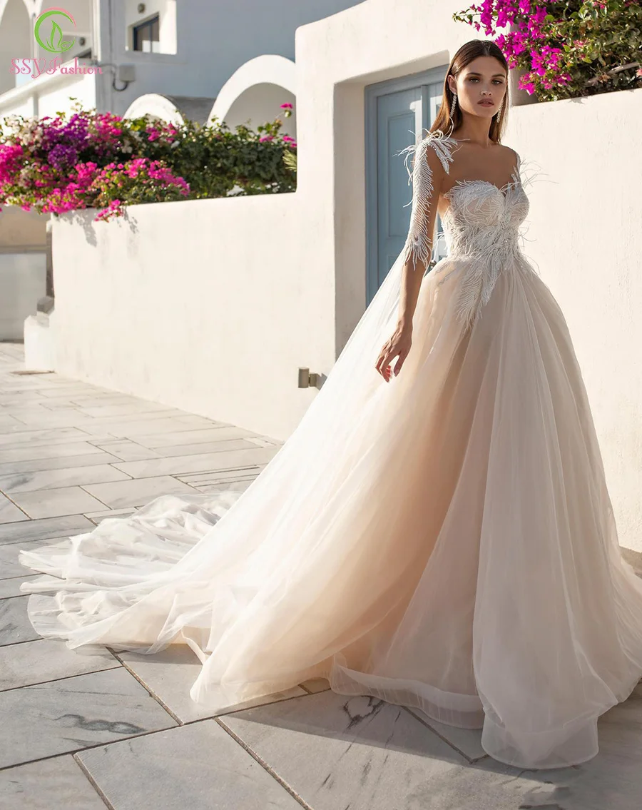 SSYFashion New Luxury Evening Dress Beach Sexy Backless Long Sleeve Appliques Feathers Bride Prom Formal Gown Vestidos De Noche
SSYFashion New Luxury Evening Dress Beach Sexy Backless Long Sleeve Appliques Feathers Bride Prom Formal Gown Vestidos De Noche