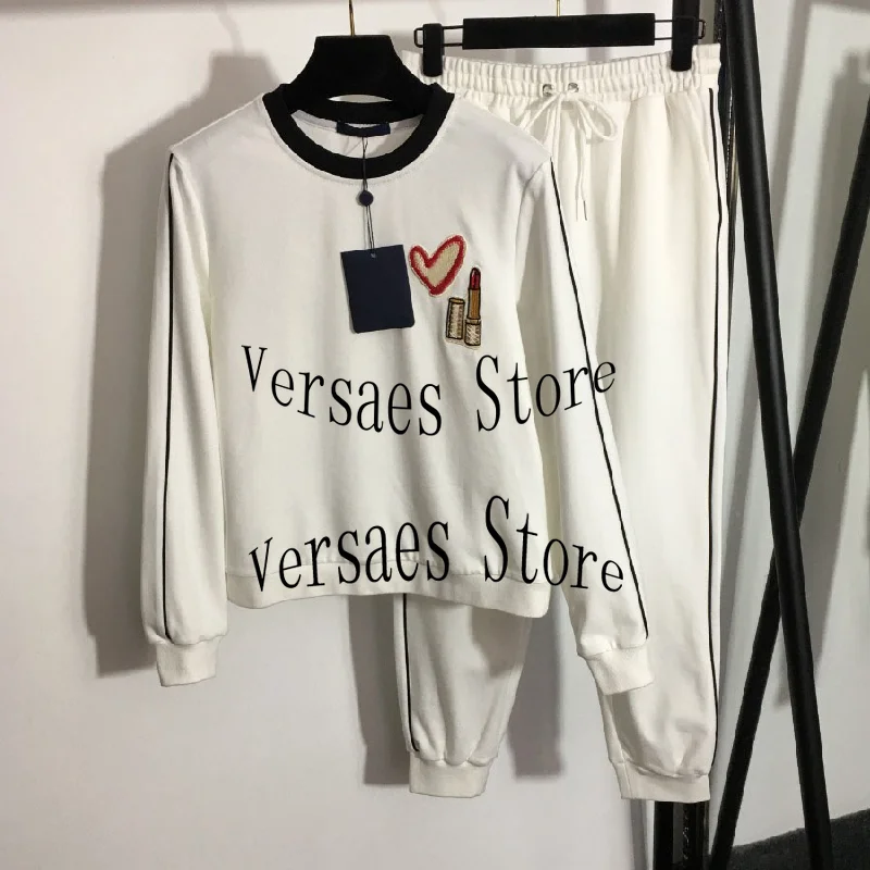 21 Luxury Design Love lipstick embroidery fashion women's long sleeved round neck sweater + high waist casual pants sports suit
21 Luxury Design Love lipstick embroidery fashion women's long sleeved round neck sweater + high waist casual pants sports suit