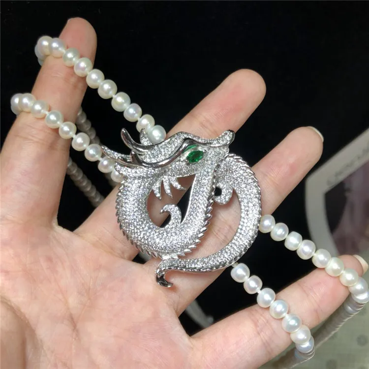 Hand knotted natural 6-7mm white round freshwater pearl dragon head micro inlay zircon accessories necklace fashion jewelry
Hand knotted natural 6-7mm white round freshwater pearl dragon head micro inlay zircon accessories necklace fashion jewelry