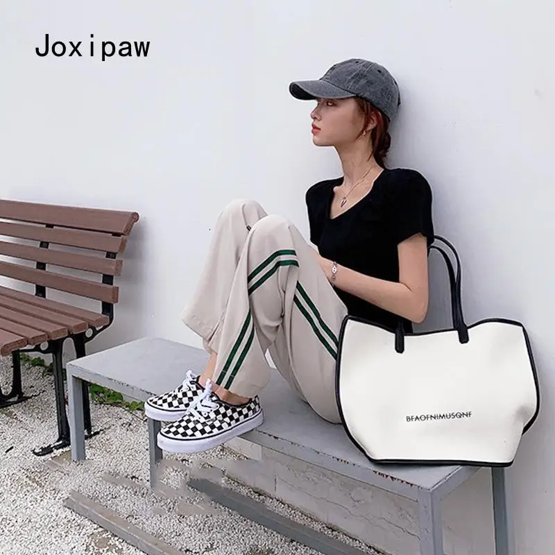 2021 Fashion Luxury Brand Designer Handbag Women's High Quality Shopping Shoulder Bag New Women's Casual Handbag Canvas Bag
2021 Fashion Luxury Brand Designer Handbag Women's High Quality Shopping Shoulder Bag New Women's Casual Handbag Canvas Bag
