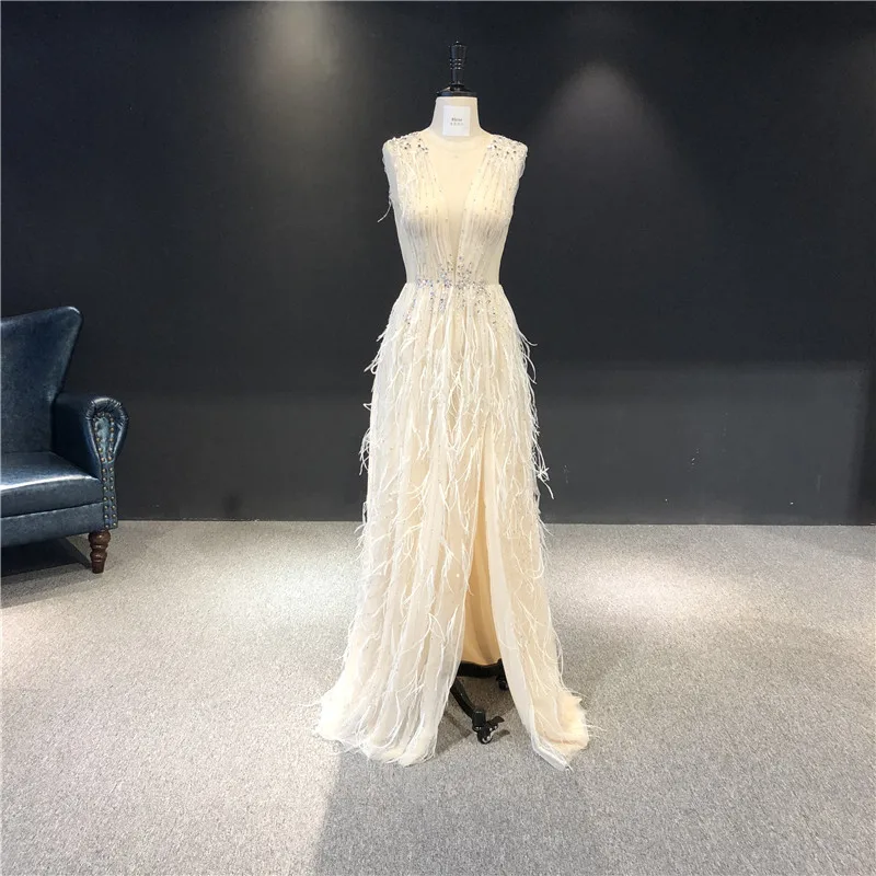 Vestidos de fiesta High Quality Customized Champagne Heavy Beadings V-neck Feathers Split Floor Length Formal Prom Evening Dress
Vestidos de fiesta High Quality Customized Champagne Heavy Beadings V-neck Feathers Split Floor Length Formal Prom Evening Dress