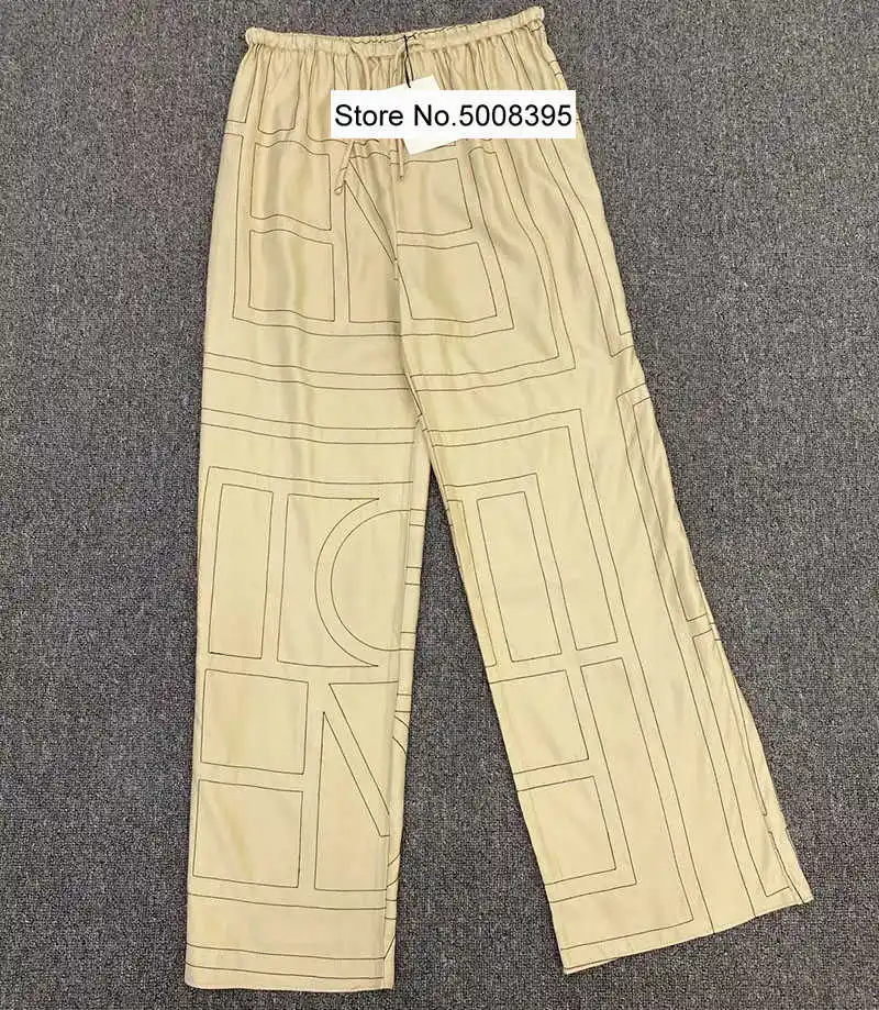 Woman Vizelle twill Silk Blend monogram embroidery Long wide leg Trousers back pocket drawstring waist Fashion pants 2021
Woman Vizelle twill Silk Blend monogram embroidery Long wide leg Trousers back pocket drawstring waist Fashion pants 2021
