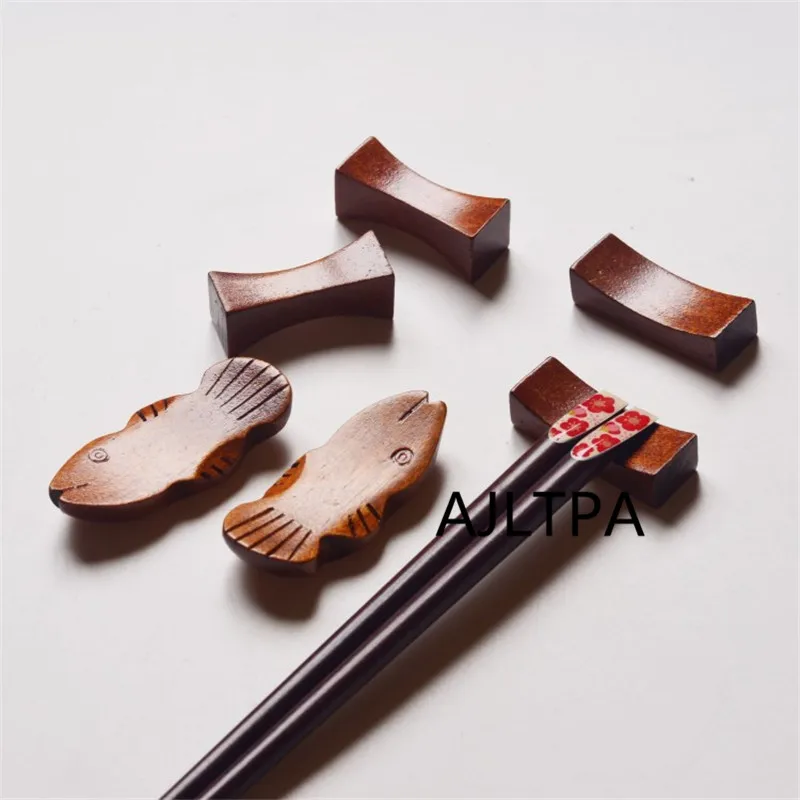 100pcs/lot Creative wood chopsticks holder hand-carved fish-shaped chopsticks holder Value Gift Chinese chopstick holder CT0131
100pcs/lot Creative wood chopsticks holder hand-carved fish-shaped chopsticks holder Value Gift Chinese chopstick holder CT0131