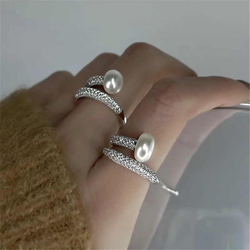 New Style Bohemia Imitation Pearl Rings Fashion Charm Women Silver Plated Adjustable Ring for Women Wedding Engagement Jewelry
New Style Bohemia Imitation Pearl Rings Fashion Charm Women Silver Plated Adjustable Ring for Women Wedding Engagement Jewelry