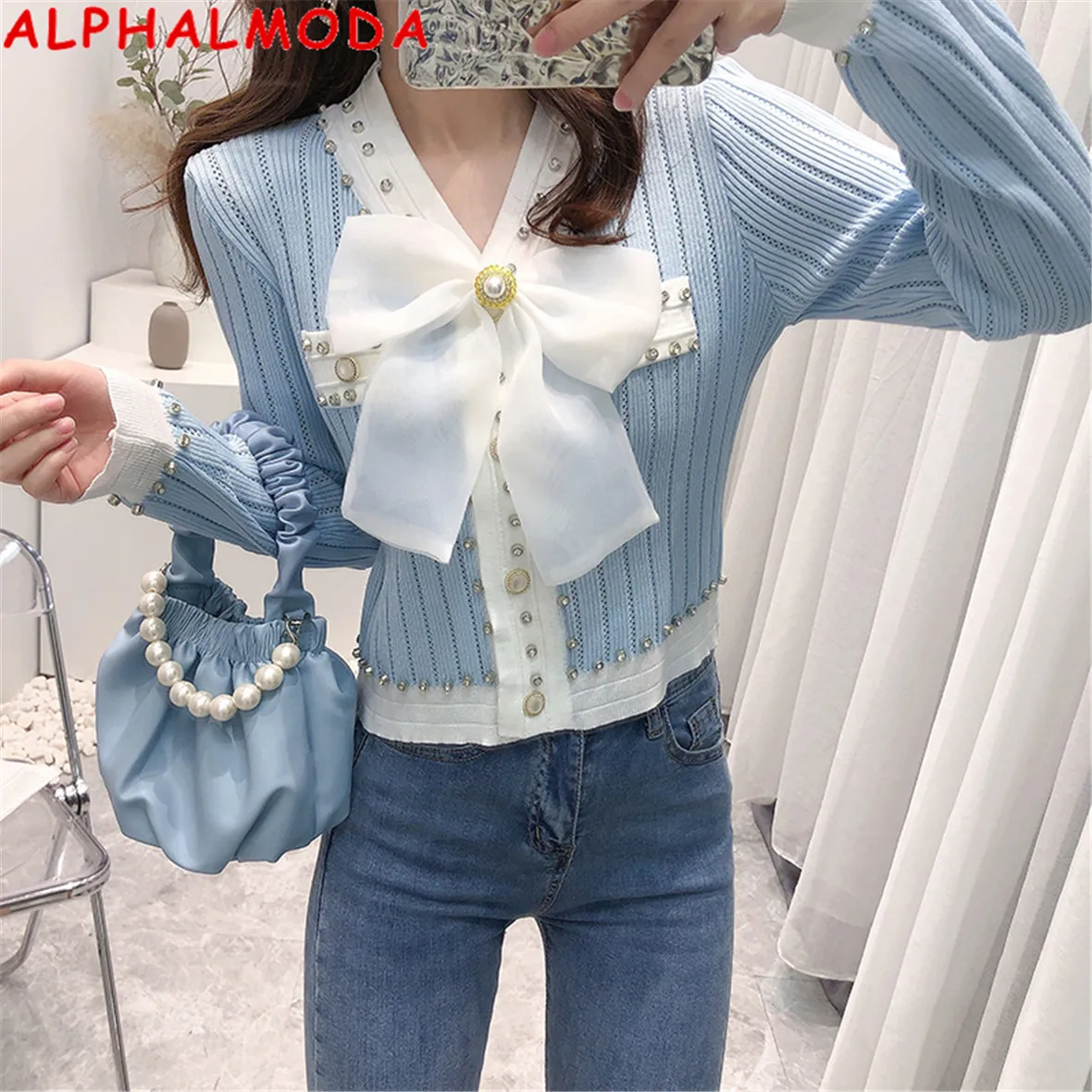 Женский длинный вязаный свитер ALPHALMODA, облегающий кардиган с бантом и бисером, осень 2021
Женский длинный вязаный свитер ALPHALMODA, облегающий кардиган с бантом и бисером, осень 2021