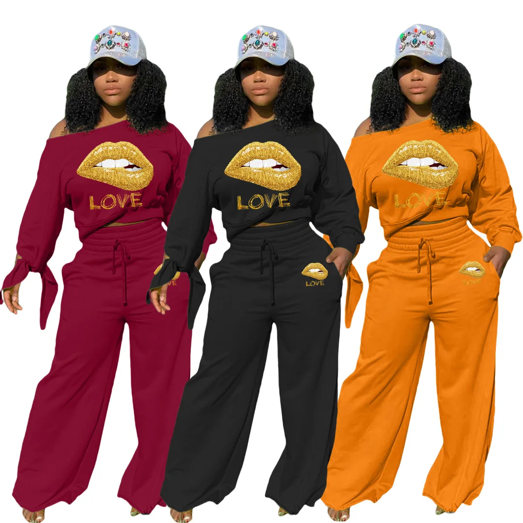 Spring and Autumn Fashion Suit Pure Color Personality Sweater Lips LOVE Cuff Knotted Wide Leg Pants Casual Two-piece Set
Spring and Autumn Fashion Suit Pure Color Personality Sweater Lips LOVE Cuff Knotted Wide Leg Pants Casual Two-piece Set
