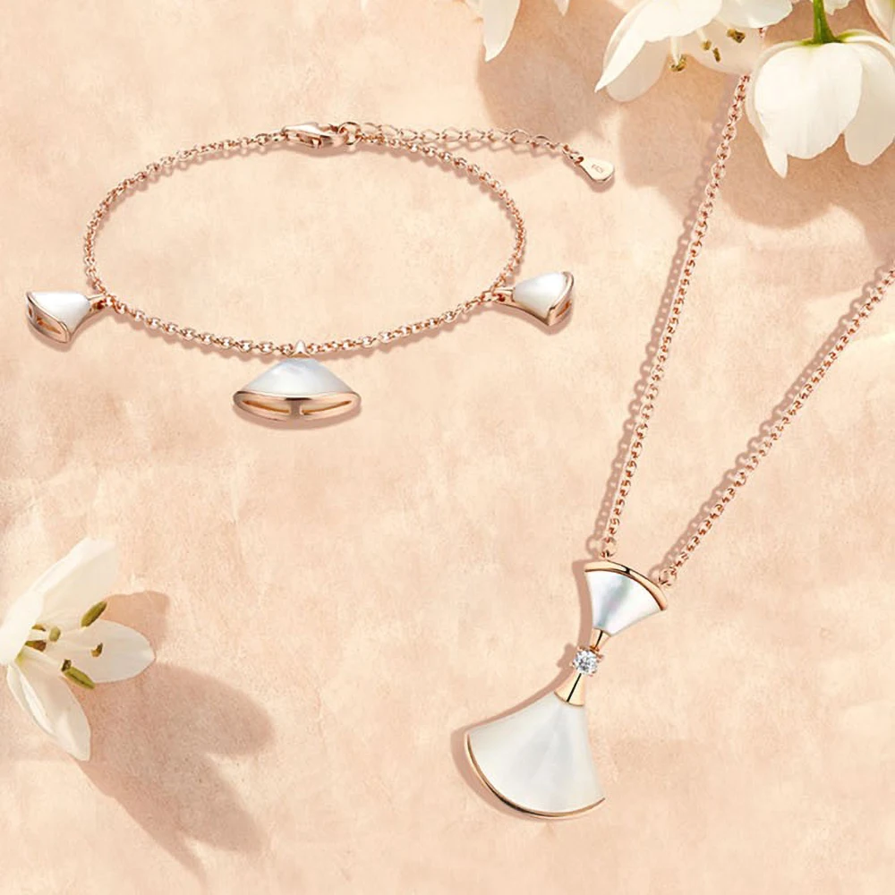 TKJ Small Skirt Necklace and Bracelet Female Rose Gold White 925 Sterling Silver Fashion Pendant Necklaces Jewery Set
TKJ Small Skirt Necklace and Bracelet Female Rose Gold White 925 Sterling Silver Fashion Pendant Necklaces Jewery Set
