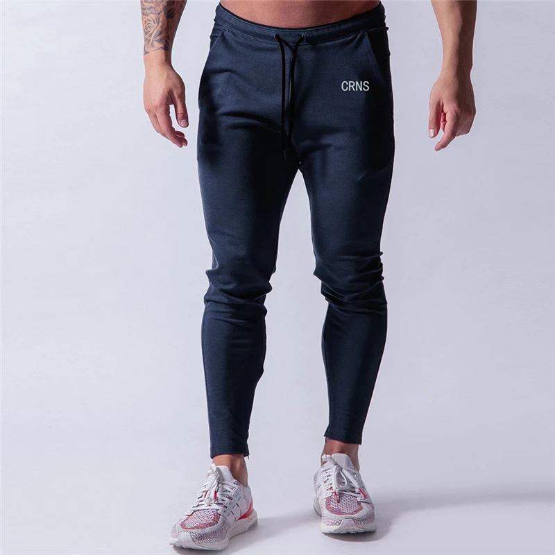 2021 Mens Joggers Sweatpants Slim Sports Pants Solid Color Gyms Workout Cotton Sportswear Autumn Men Trouser Fitness Track Pants
2021 Mens Joggers Sweatpants Slim Sports Pants Solid Color Gyms Workout Cotton Sportswear Autumn Men Trouser Fitness Track Pants