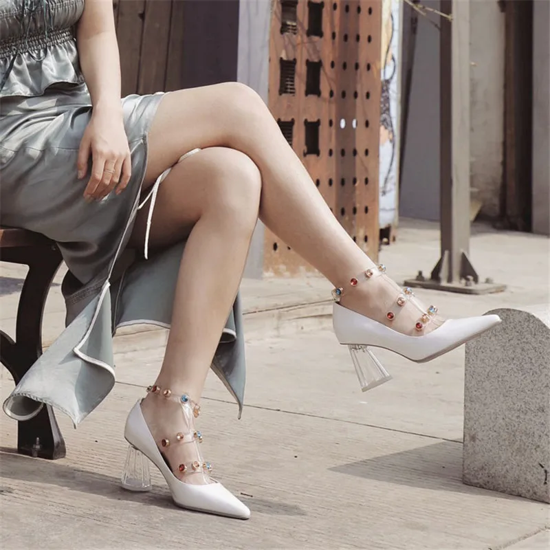 Spring and summer new pointed shallow mouth high heels sexy word color diamond transparent thick with women's wild patent leathe
Spring and summer new pointed shallow mouth high heels sexy word color diamond transparent thick with women's wild patent leathe