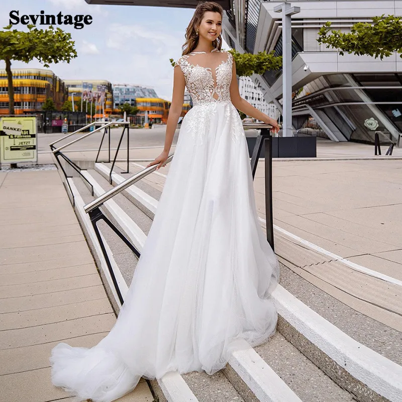 Sevintage Princess Lace Wedding Dresses 2021 Appliqued Boho Wedding Gowns Sexy Split Sheer Back Beach Bride Dress Custom Made
Sevintage Princess Lace Wedding Dresses 2021 Appliqued Boho Wedding Gowns Sexy Split Sheer Back Beach Bride Dress Custom Made