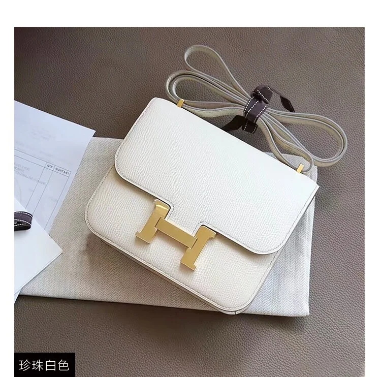 Kangkang bag 2021 new female messenger bag h-button small square bag leather one shoulder beancurd bag lock fashion stewardess
Kangkang bag 2021 new female messenger bag h-button small square bag leather one shoulder beancurd bag lock fashion stewardess
