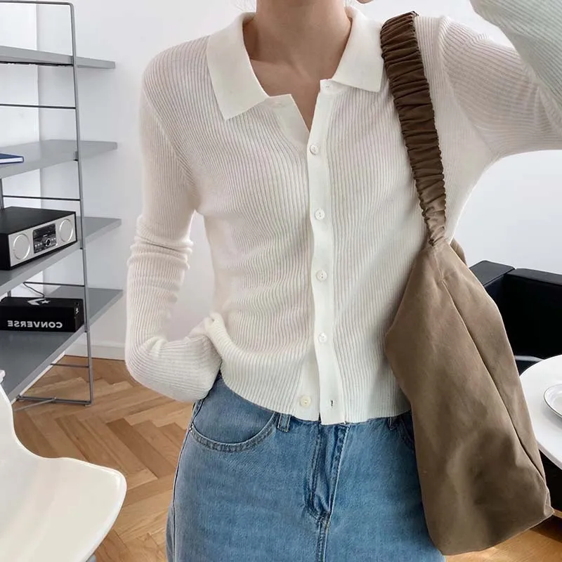 French Short Long-sleeved Rip-neck Knitwear Women's Autumn New Outer Wear Slim Sweater Jacket 
French Short Long-sleeved Rip-neck Knitwear Women's Autumn New Outer Wear Slim Sweater Jacket