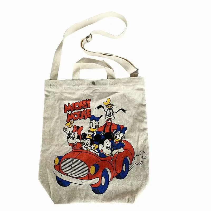 2021 disney Mickey canvas single shoulder straddle bag adjustable shoulder strap buckle student bag casual Travel shopping bag
2021 disney Mickey canvas single shoulder straddle bag adjustable shoulder strap buckle student bag casual Travel shopping bag