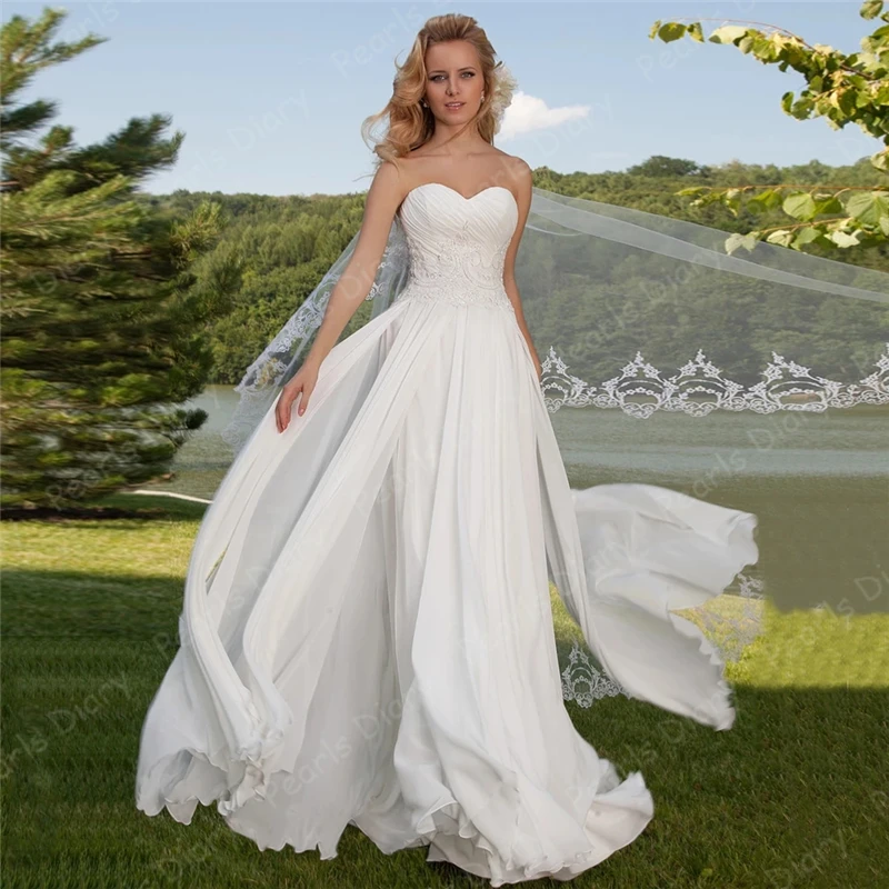 Tempting Sweetheart Sleeveless Wedding Dresses Ruched Applique Beach Bridal Gowns Corset Bride Dress 2021 Newest Robe De Mariee
Tempting Sweetheart Sleeveless Wedding Dresses Ruched Applique Beach Bridal Gowns Corset Bride Dress 2021 Newest Robe De Mariee