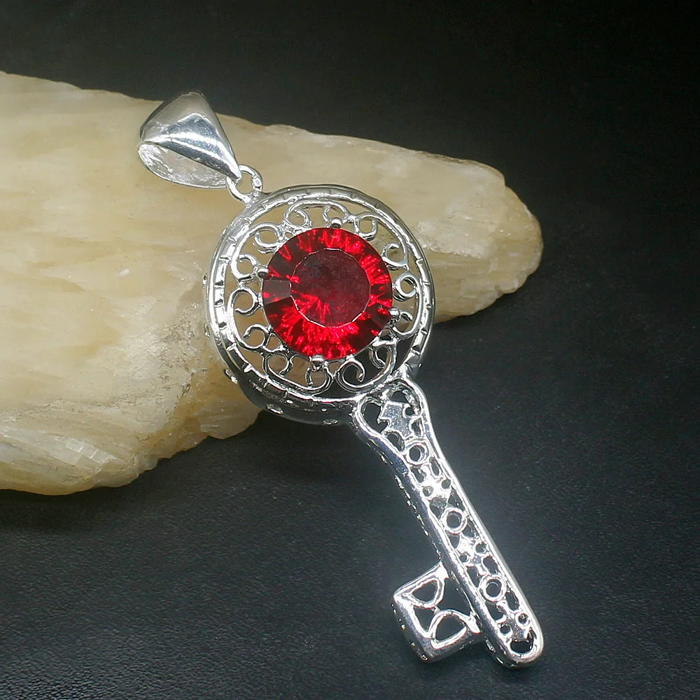 Женский кулон с красным топазом, серебро 925 пробы, 20213850 
Женский кулон с красным топазом, серебро 925 пробы, 20213850