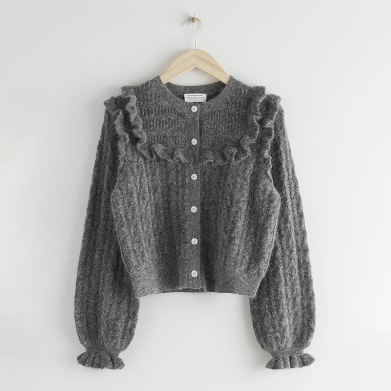 2021 Autumn and Winter New Women Sweater Two-color Doll Collar Lotus Leaf Sleeve Fashion All-match Knitted Cardigan Women
2021 Autumn and Winter New Women Sweater Two-color Doll Collar Lotus Leaf Sleeve Fashion All-match Knitted Cardigan Women