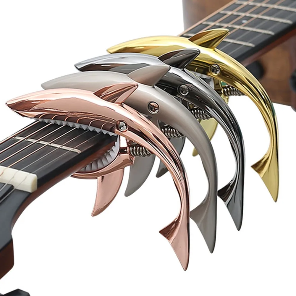 Universal Guitar Capo Sharks Shape Quick Change Clamp Key Zinc Alloy Acoustic Classic Guitar Capo Trigger Bass Parts Accessories
Universal Guitar Capo Sharks Shape Quick Change Clamp Key Zinc Alloy Acoustic Classic Guitar Capo Trigger Bass Parts Accessories