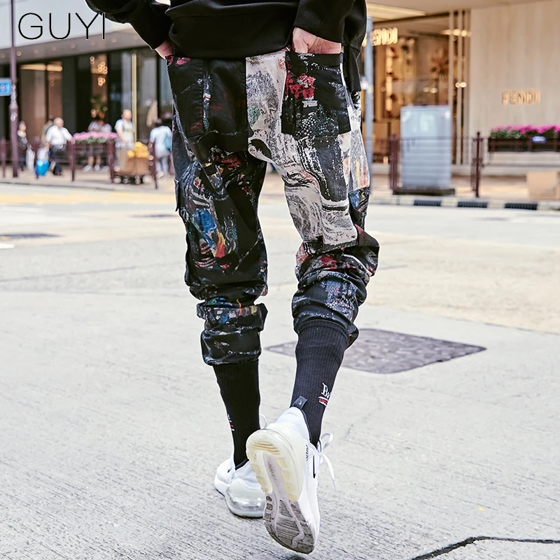 Camouflage Graffiti Patchwork Pocket Cargo Pants for Men Joggers Sweatpants Hip Hop Trousers Casual Male Streetwear Pencil Pants
Camouflage Graffiti Patchwork Pocket Cargo Pants for Men Joggers Sweatpants Hip Hop Trousers Casual Male Streetwear Pencil Pants
