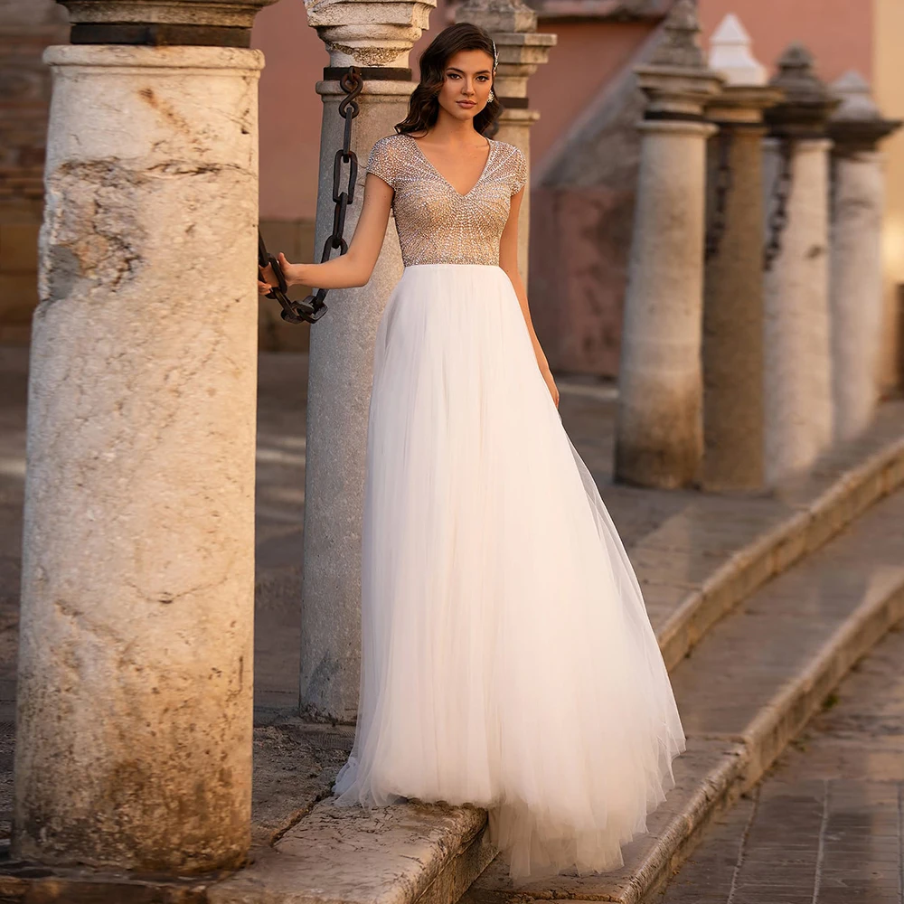 2021 New Summer Sexy White Short Sleeve Illusion Wedding Dresses High Quality V-Neck Chiffon Floor-Length Custom Made Color
2021 New Summer Sexy White Short Sleeve Illusion Wedding Dresses High Quality V-Neck Chiffon Floor-Length Custom Made Color