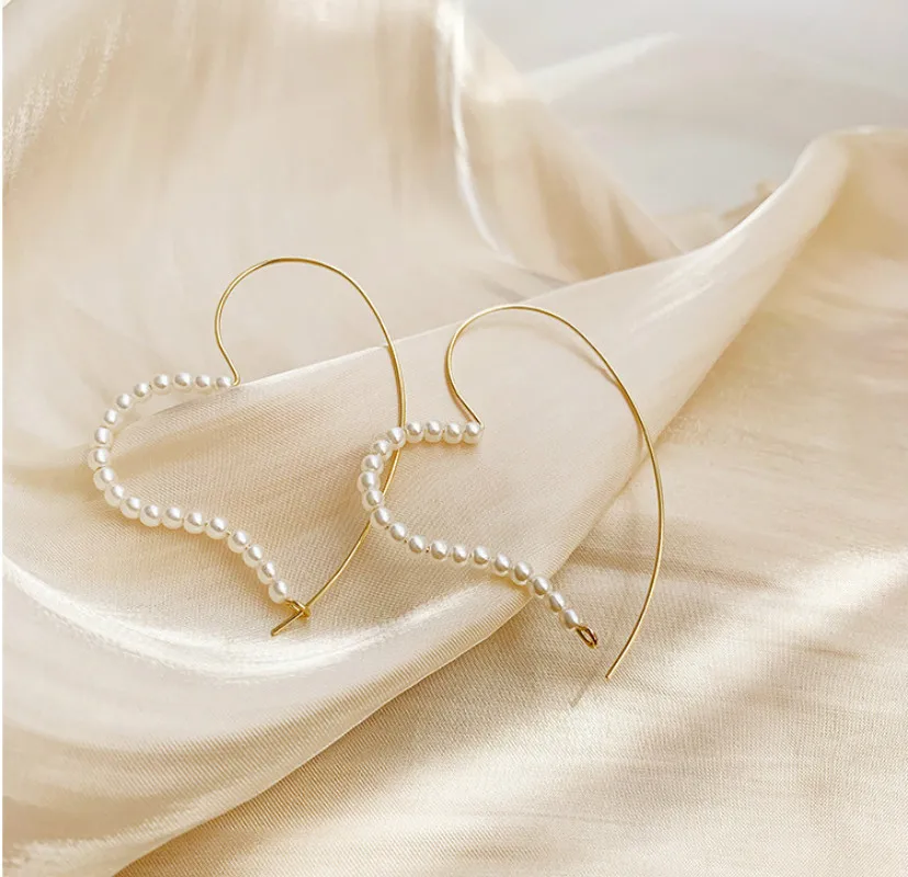 New Jewelry Net Red Fashion Love Pearl Heart-Shaped Earrings Female Exaggerated Large Earrings Metal Punk Round Earrings
New Jewelry Net Red Fashion Love Pearl Heart-Shaped Earrings Female Exaggerated Large Earrings Metal Punk Round Earrings