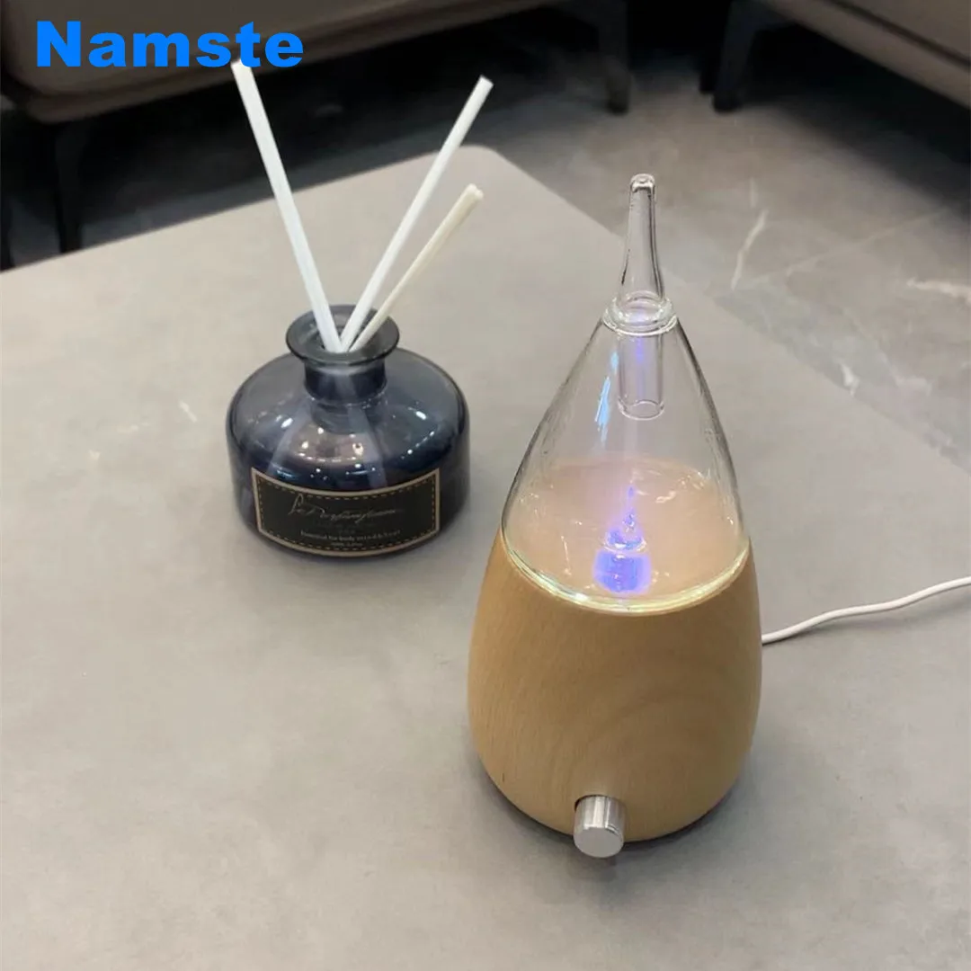 NMT 213 Aroma Diffuser Adjustable Spray Volume Air Purifier Glass Shape With 7-Color LED Light Suitable For Office And Home Use
NMT 213 Aroma Diffuser Adjustable Spray Volume Air Purifier Glass Shape With 7-Color LED Light Suitable For Office And Home Use