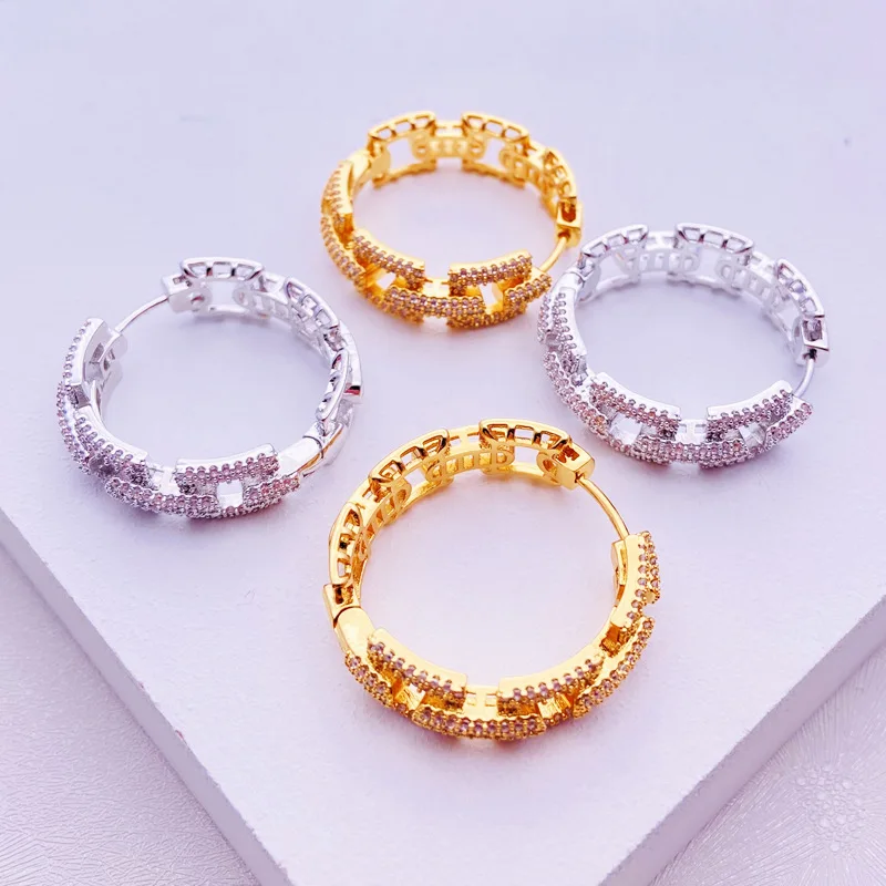 European and American design hoop earrings female micro-inlaid zircon ins wind autumn and winter new year earrings earring 
European and American design hoop earrings female micro-inlaid zircon ins wind autumn and winter new year earrings earring