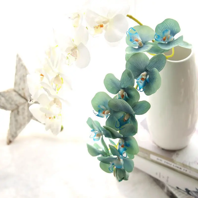 Eleven head handle gluing of Phalaenopsis Artificial Flowers Fake Flowers for Home Wedding Decoration 
Eleven head handle gluing of Phalaenopsis Artificial Flowers Fake Flowers for Home Wedding Decoration