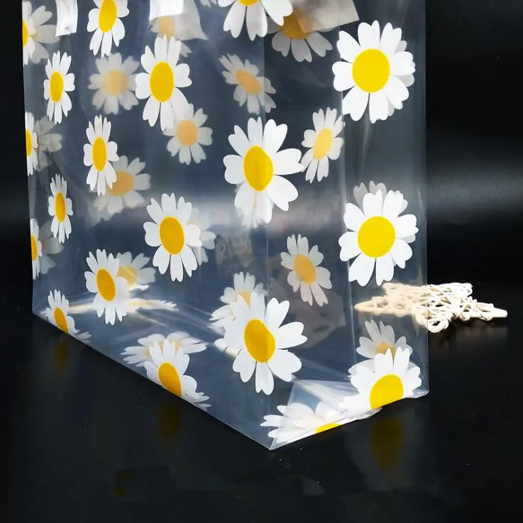 50pcs Transparent Small Daisy Portable Clothing Gift Bag Shopping Plastic Plastic Bag Women's Gift Bag Packaging Bag
50pcs Transparent Small Daisy Portable Clothing Gift Bag Shopping Plastic Plastic Bag Women's Gift Bag Packaging Bag