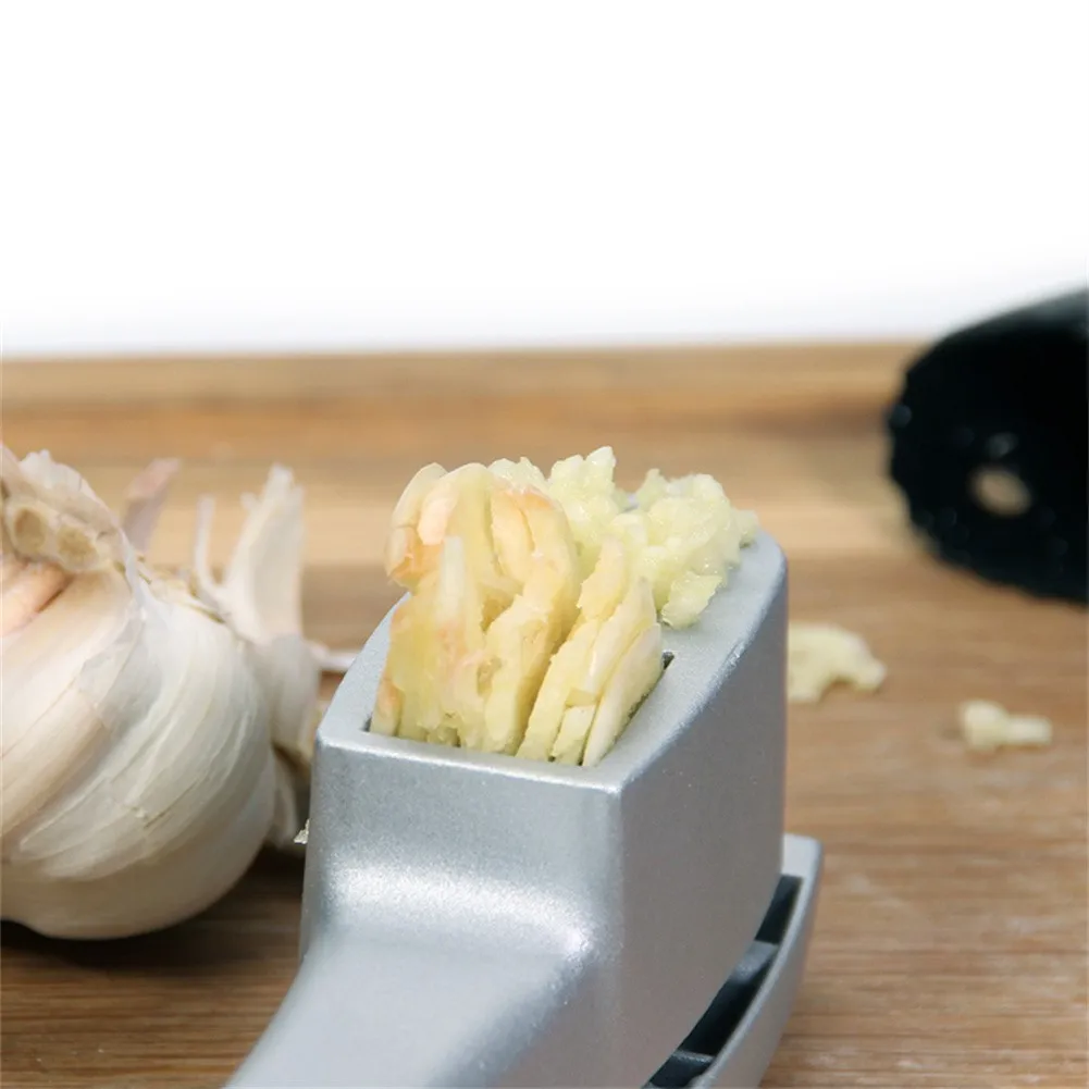 Garlic Press Slicer 2 In 1 Manual Garlic Press Aluminum Garlic Press Multifunctional Garlic Squeezer Masher Kitchen Cooking Tool
Garlic Press Slicer 2 In 1 Manual Garlic Press Aluminum Garlic Press Multifunctional Garlic Squeezer Masher Kitchen Cooking Tool
