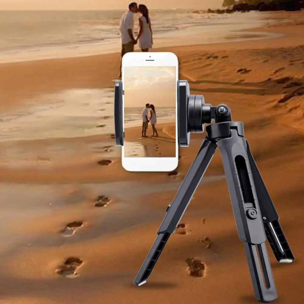 Video Tripod Stand Handle Mini Telescopic Smartphone Grip Compact Selfie Stick Stabilizer Tripod for Phone Clip 
Video Tripod Stand Handle Mini Telescopic Smartphone Grip Compact Selfie Stick Stabilizer Tripod for Phone Clip