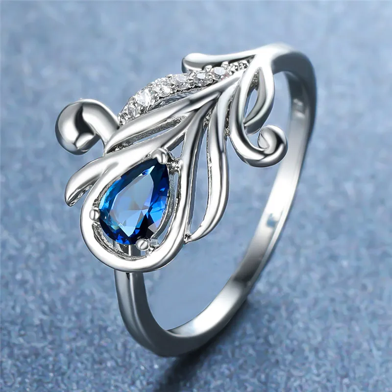 Vintage Female Red Blue Green White Crystal Ring Luxury Silver Color Wedding Rings For Women Charm Peacock Tail Engagement Ring
Vintage Female Red Blue Green White Crystal Ring Luxury Silver Color Wedding Rings For Women Charm Peacock Tail Engagement Ring