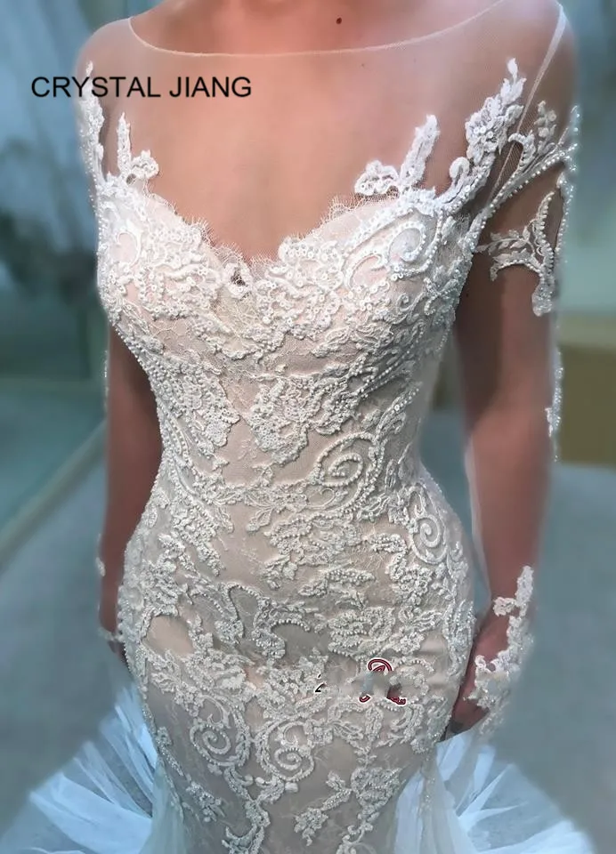 Long Sleeves Lace Applique Muslim Dubai Wedding Dresses Custom made Crystal Beaded Mermaid See Through Back Bride Dress
Long Sleeves Lace Applique Muslim Dubai Wedding Dresses Custom made Crystal Beaded Mermaid See Through Back Bride Dress