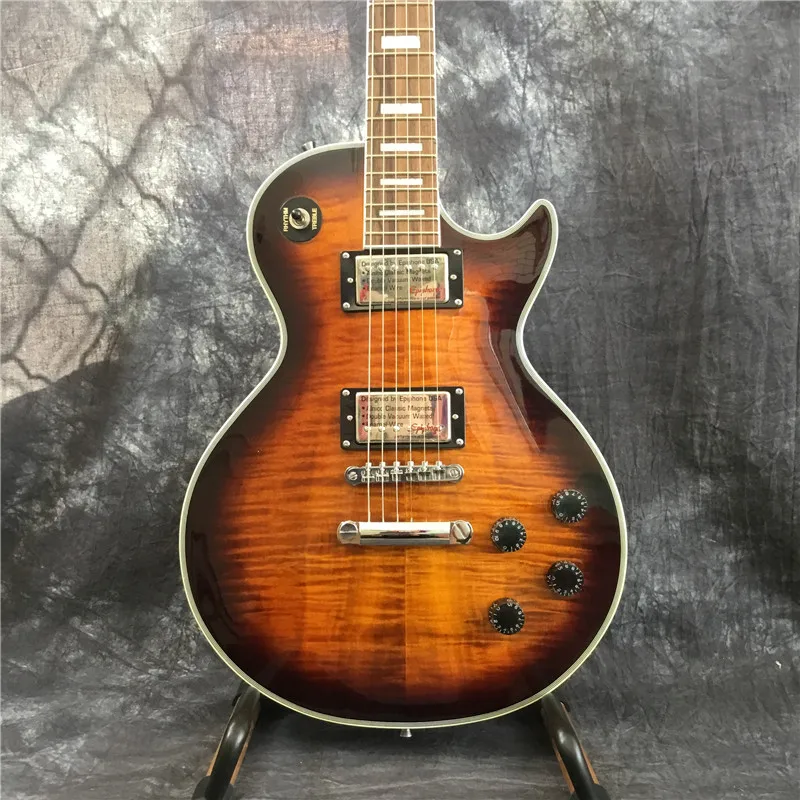 Wholesale high-quality custom electric guitar, Tiger Flame top guitar. Rosewood fingerboard.
Wholesale high-quality custom electric guitar, Tiger Flame top guitar. Rosewood fingerboard.