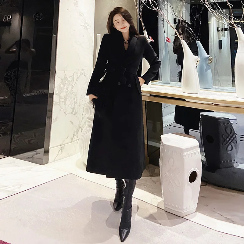 Black woolen coat women's middle long 2021 new winter fashion temperament Hepburn thickened wool coat
Black woolen coat women's middle long 2021 new winter fashion temperament Hepburn thickened wool coat