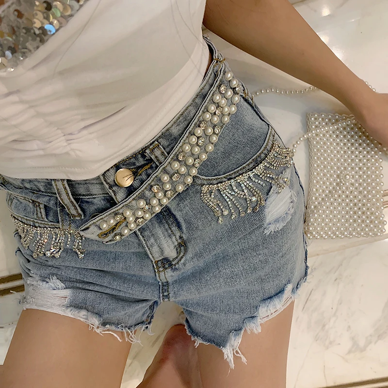 Ins Chic Summer New Hot Sexy Ladies Hole Deinm Jeans Shorts Special Beading Belt Design Women Wide Leg Short Pants
Ins Chic Summer New Hot Sexy Ladies Hole Deinm Jeans Shorts Special Beading Belt Design Women Wide Leg Short Pants