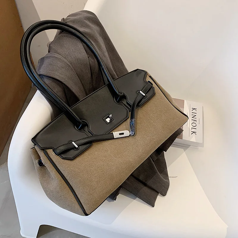 Color Matching Bag Women 2020 New Thick Canvas with Pu Platinum Bag Fashion Handbag Shoulder Messenger Kelly Bag
Color Matching Bag Women 2020 New Thick Canvas with Pu Platinum Bag Fashion Handbag Shoulder Messenger Kelly Bag
