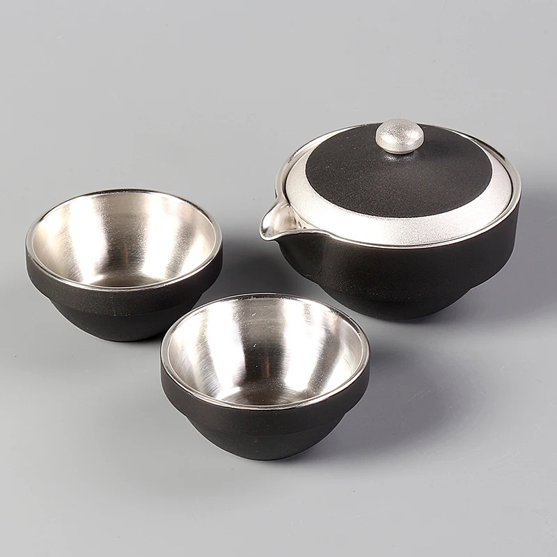 Gilt silver quick guest cup, one pot, two cups, 2 people ceramic Kung Fu Japanese office portable travel tea set
Gilt silver quick guest cup, one pot, two cups, 2 people ceramic Kung Fu Japanese office portable travel tea set