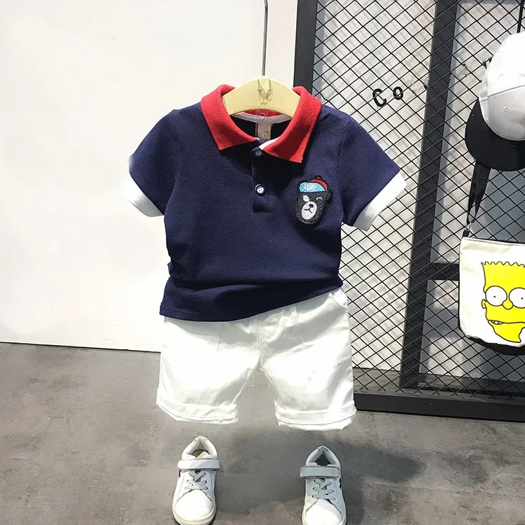 Hot children's clothing Fashion boy suit boys summer new casual lapel solid color T-shirt children's tops+casual shorts sets 
Hot children's clothing Fashion boy suit boys summer new casual lapel solid color T-shirt children's tops+casual shorts sets