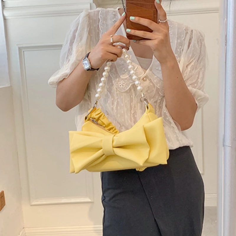 Creative Design Handbag Female 2021 Summer New Style Korean Bow Pearl Underarm Bag Women's Shoulder Messenger Bag
Creative Design Handbag Female 2021 Summer New Style Korean Bow Pearl Underarm Bag Women's Shoulder Messenger Bag