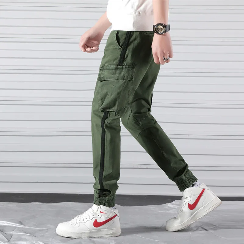 Брюки-карго мужские с манжетами, уличная одежда, брюки в стиле хип-хоп, составного кроя, с карманами, в полоску сбоку
Брюки-карго мужские с манжетами, уличная одежда, брюки в стиле хип-хоп, составного кроя, с карманами, в полоску сбоку